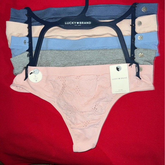 5 packs of lace thongs Set (NWT )